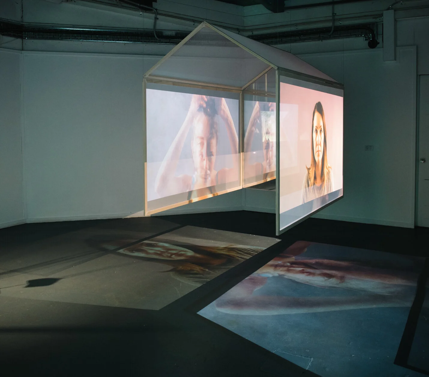 Linda Clark, Bearing Witness: Absence&nbsp;2019. Timber, fabric, wire, video projection 55 seconds looped. Installation dimensions variable. Used with permission. Photo Credits: Anna Singleton