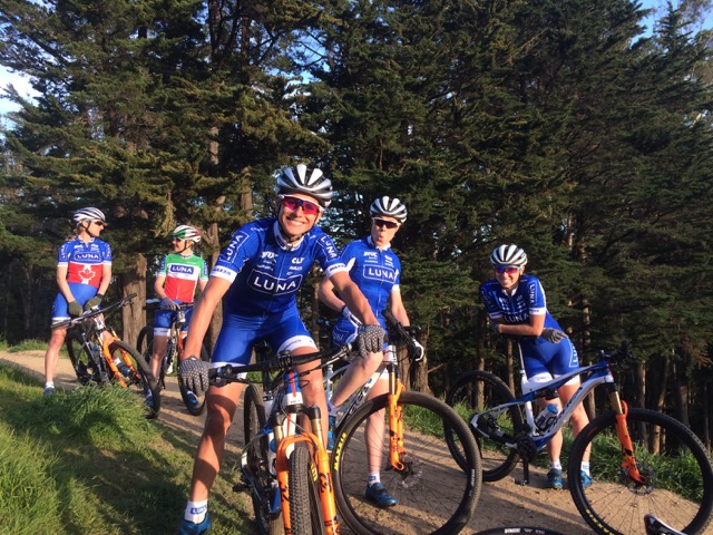 Having fun while preparing to ride our tiny segment of trail for the 57th time during an evening photoshoot :) 