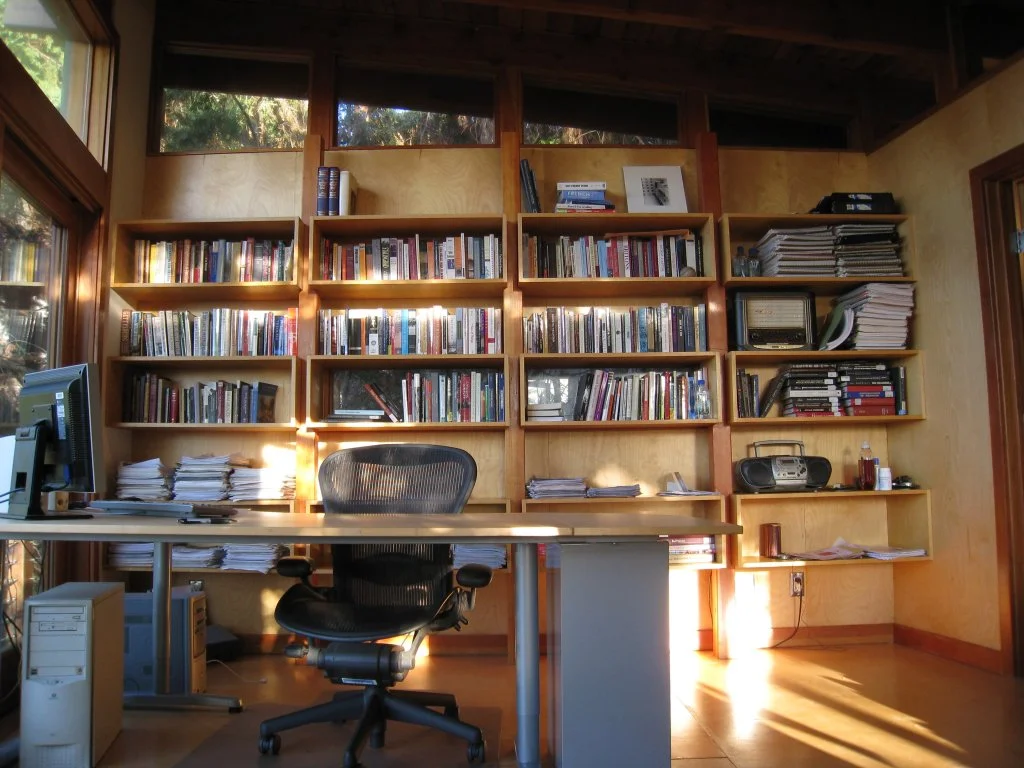 marvelous-brown-home-office-inspiring-design-hidden-lamp-brown-varnished-wooden-shelf-cream-l-shaped-laminated-wooden-tribeca-loft-office-desk-black-fabric-sliding-chair-brown-laminated-floor-books-co.jpg