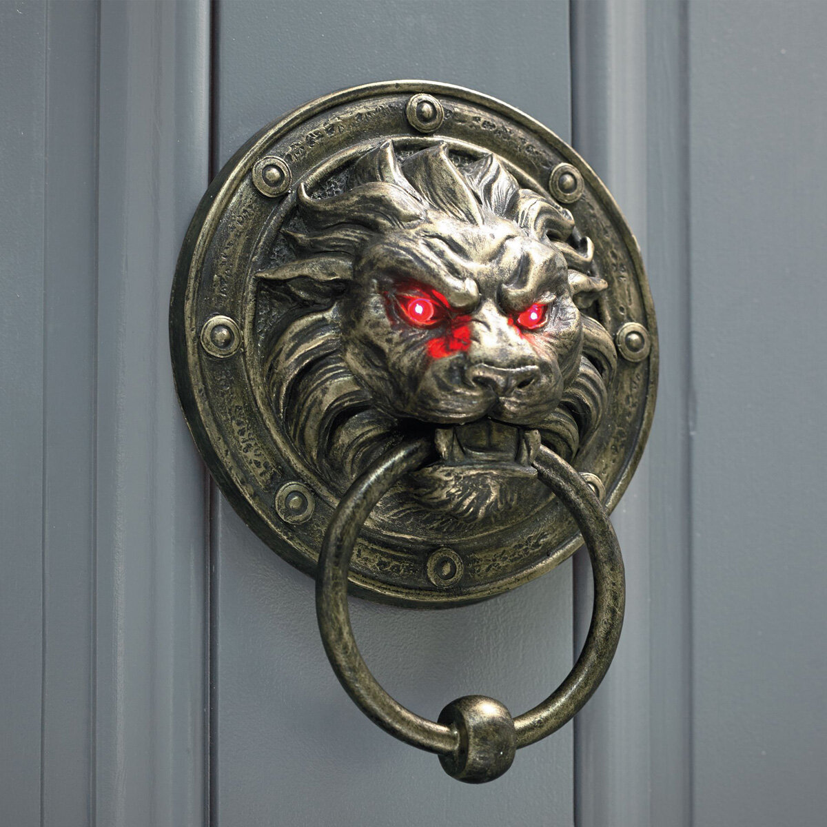 glowing-eyes-lion-door-knocker-1.jpg