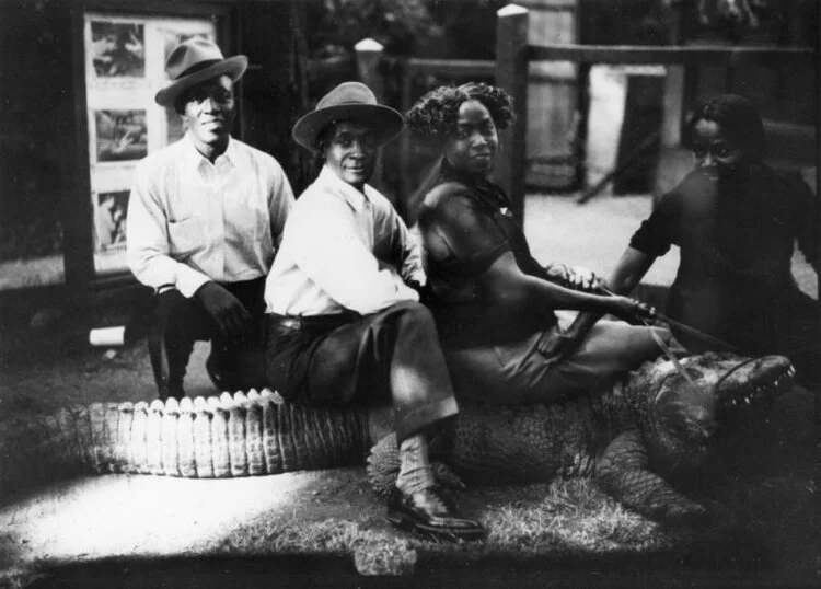 Sitting_on_an_alligator+-+LAPL+-+c.+1945.jpg