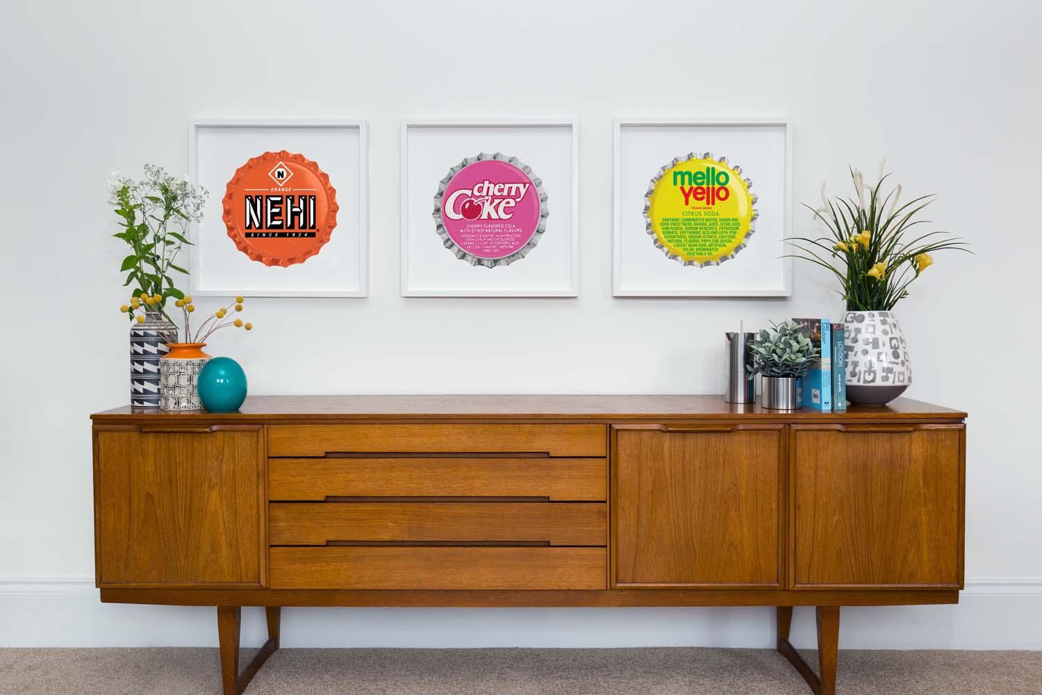 A sideboard with a selection of Go Pop prints