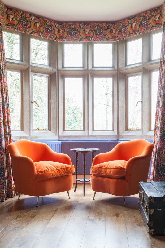 Designers Guild Varese Zinnia chairs, with Liberty's Patricia Spice curtains/Photo: Susie Lowe