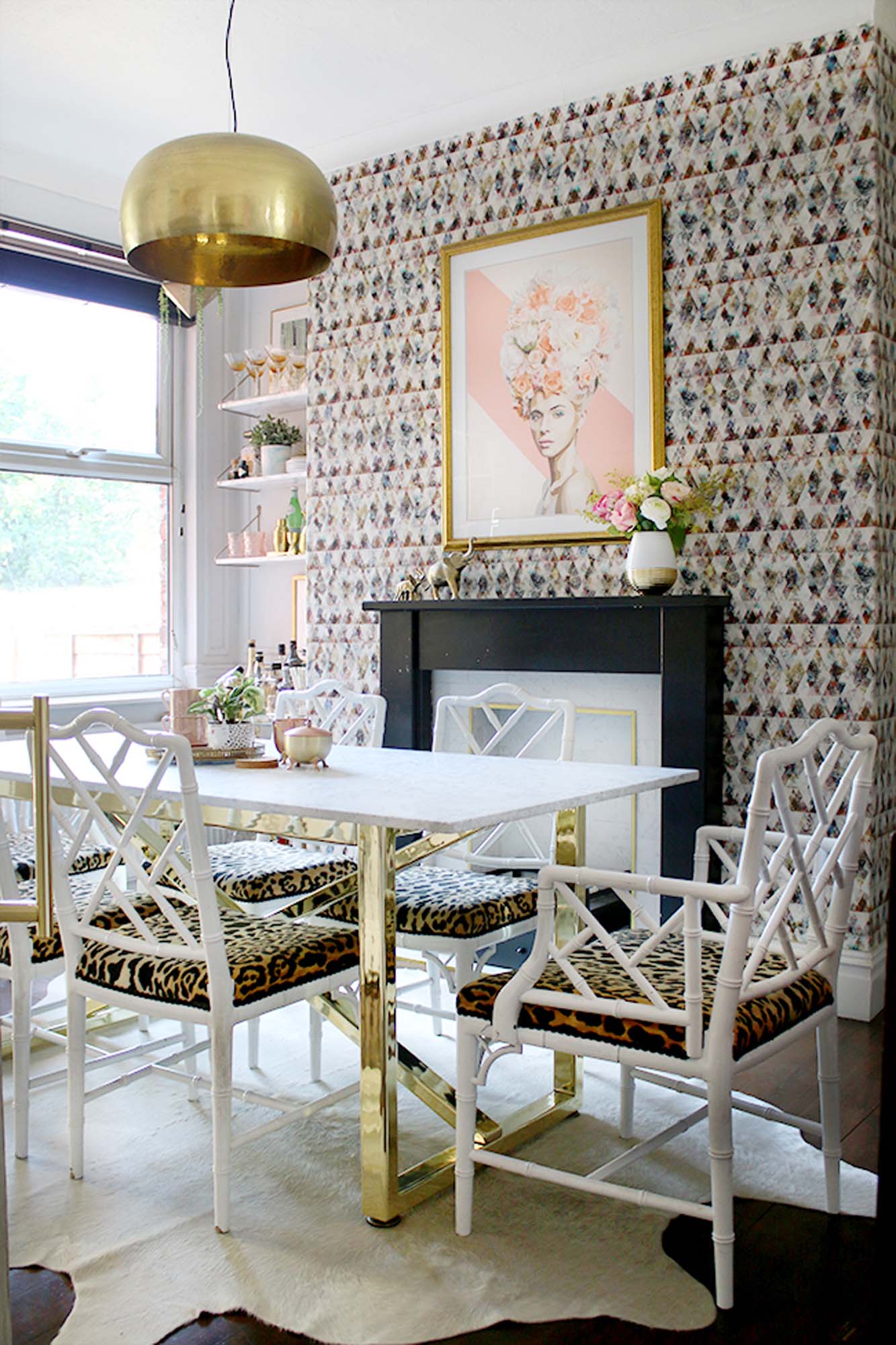 Swoon Worthy glamorous dining room with leopard print chairs