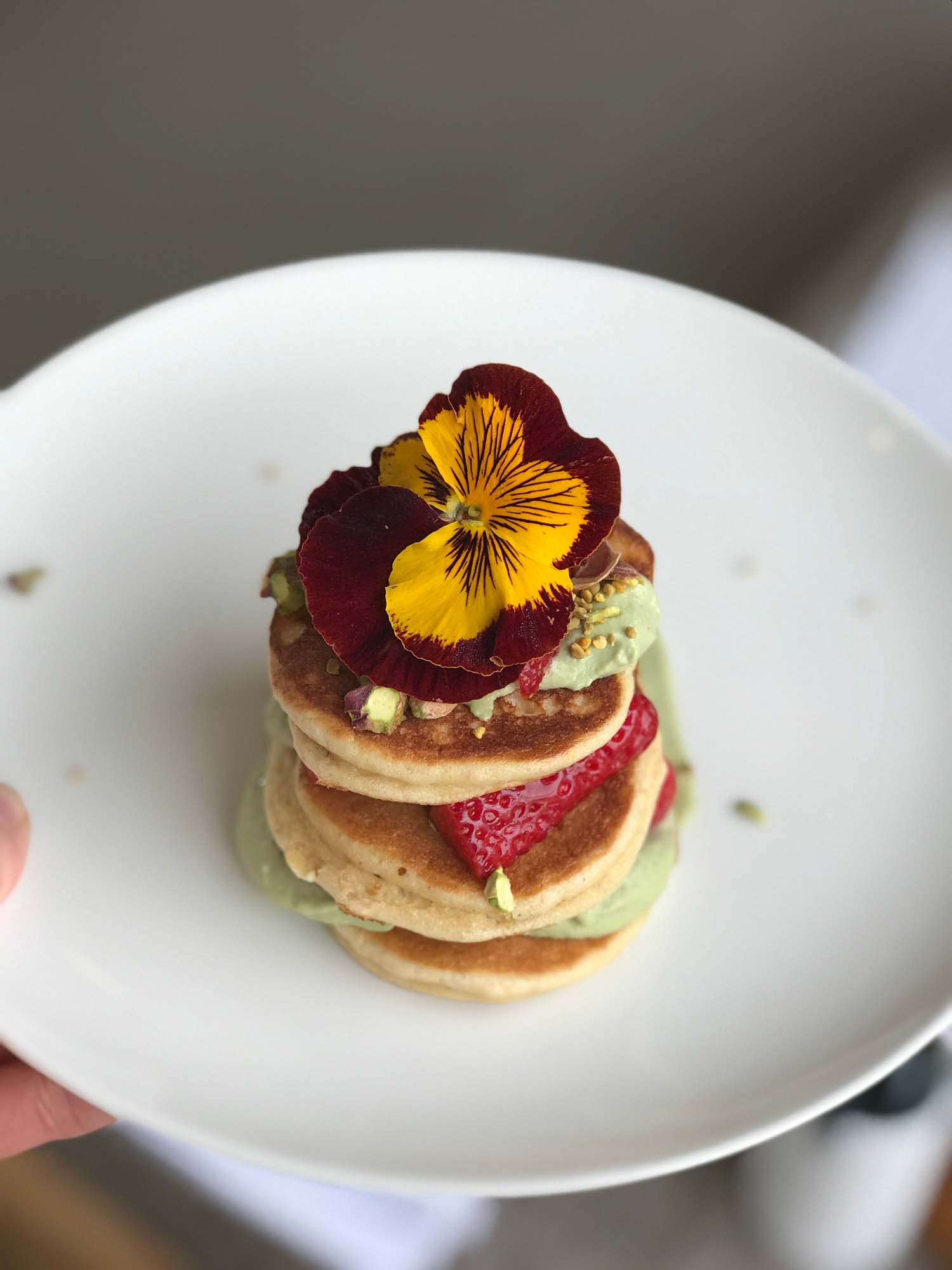 Ben's dairy-free and delicious almond pancakes with matcha cream and strawberries
