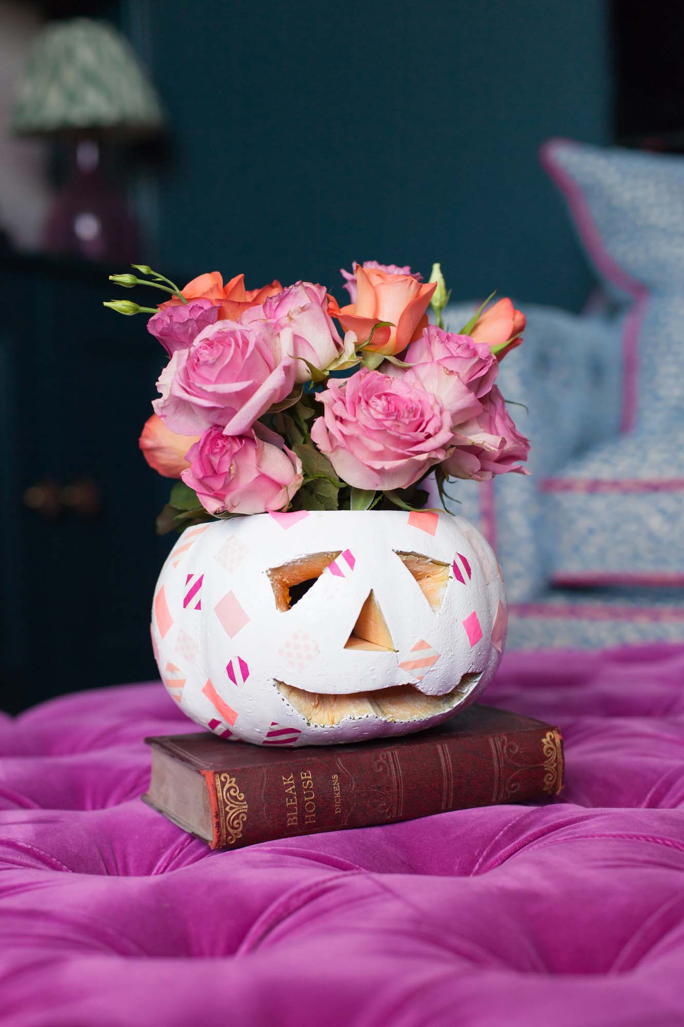 White pumpkin with pink washi tape as a flower vase