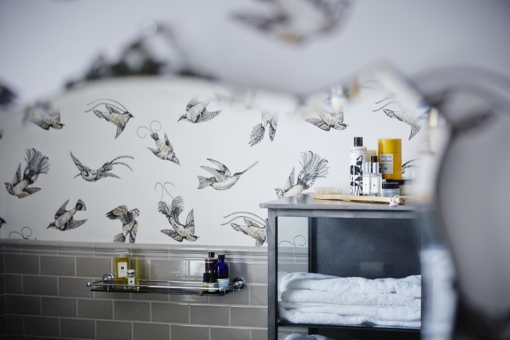 This wallpapered bathroom was designed by my talented interior designer cousin, Eleanor Horwell