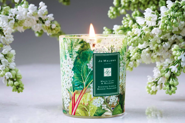 White Lilac &amp; Rhubarb Charity Home Candle by Jo Malone, £47. Three quarters of the RRP goes to supporting individuals and families affected by mental health problems through dedicated projects with inspirational charities.