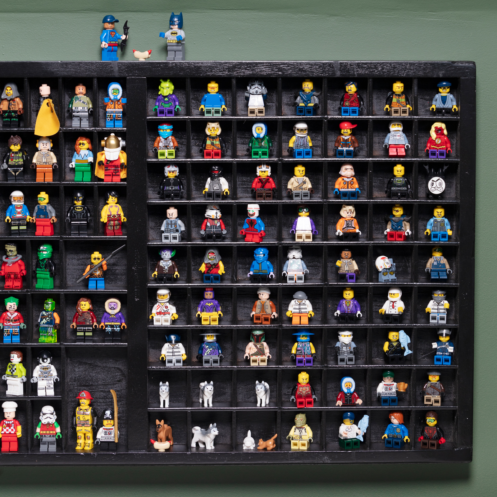 Lego mini figures people displayed in a boy's bedroom