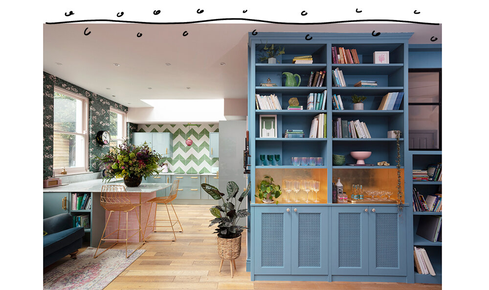 Pink kitchen with wallpaper and blue shelving