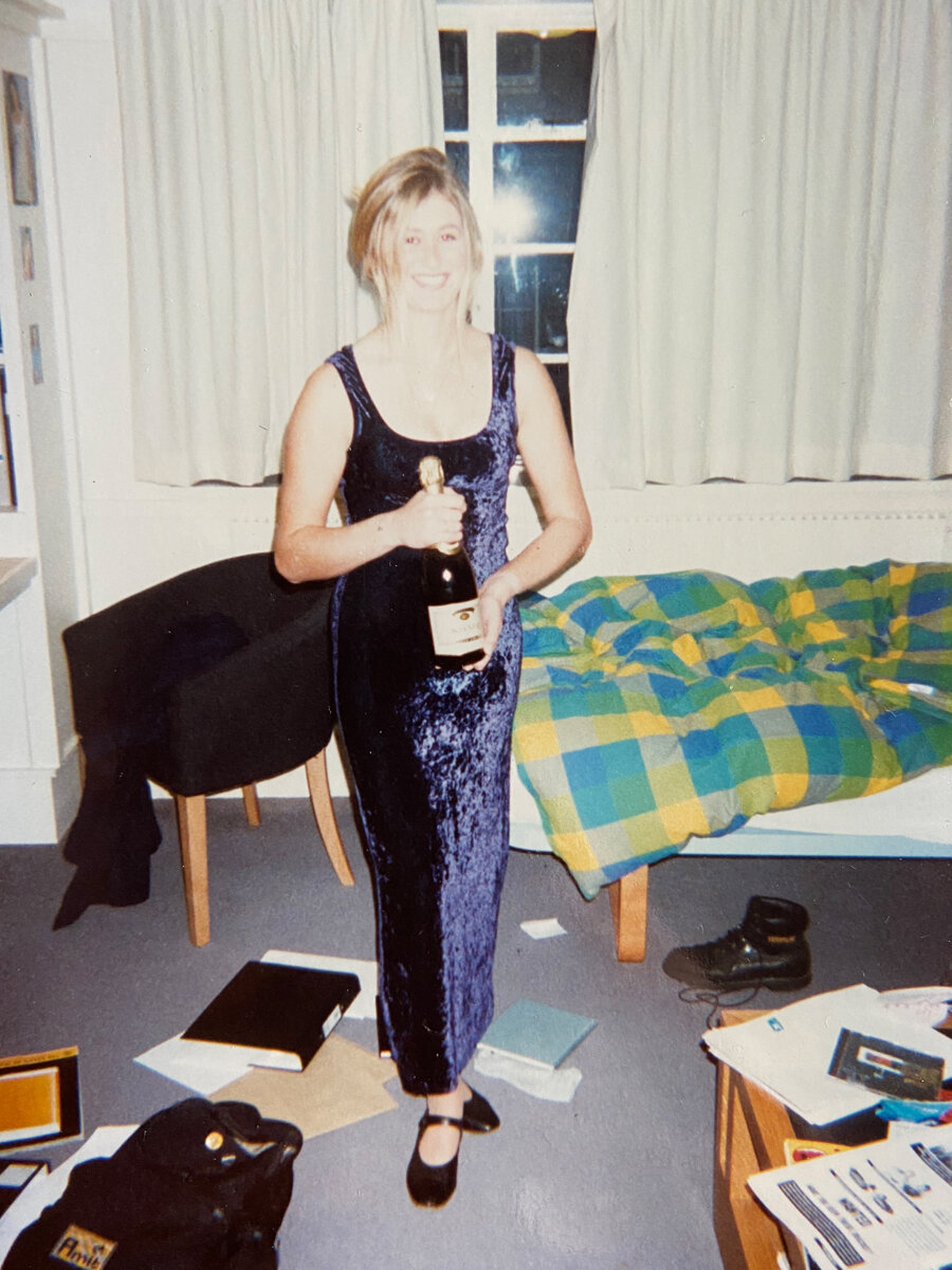 Me in 1996 in my friend’s room at Trinity College, Cambridge, wearing my stretchy velvet matriculation dress which shows off my ‘I can bench press a man’ rowing shoulders