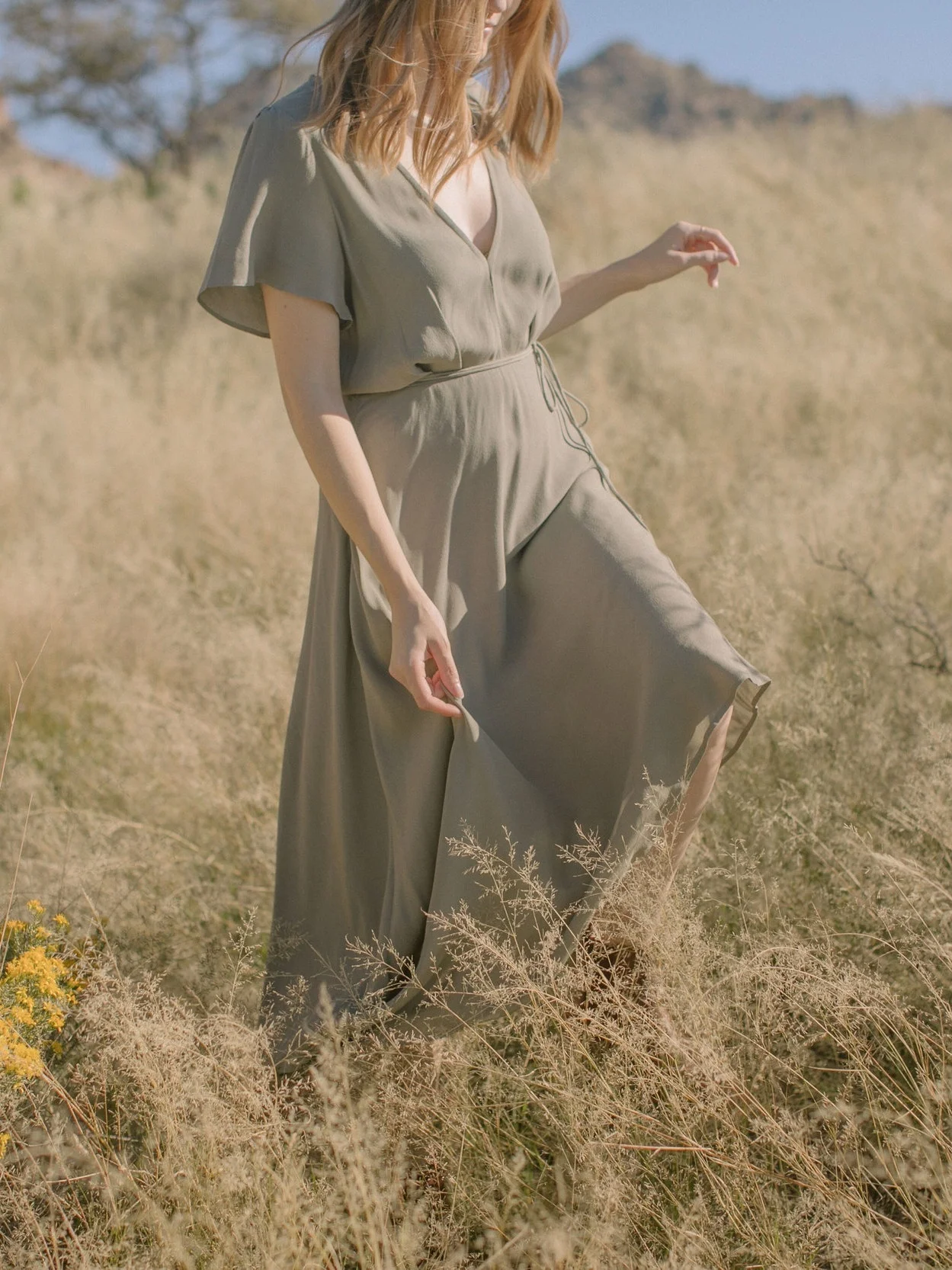 Sage bridesmaid dress with asymmetric hem