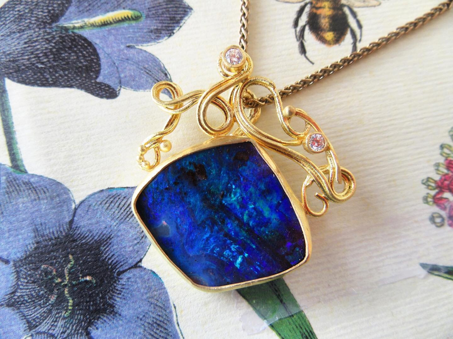 Look at the piece! It was made as a special, one of a kind Valentine&rsquo;s Day gift. This piece was made with a 17.11 carat Boulder Opal set in 22k gold fused with design swirls. Each diamond weighs .07 carats 💎
.
.
.
#karenldavidson #karendavidso