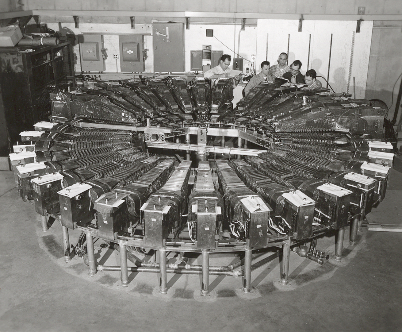   50 MeV machine on site at Midwestern Universities Research Association (MURA). Hugh Thornton, Carl Bauman, and Charlie Pratt.&nbsp; Photo: University of Wisconsin Madison Archives  