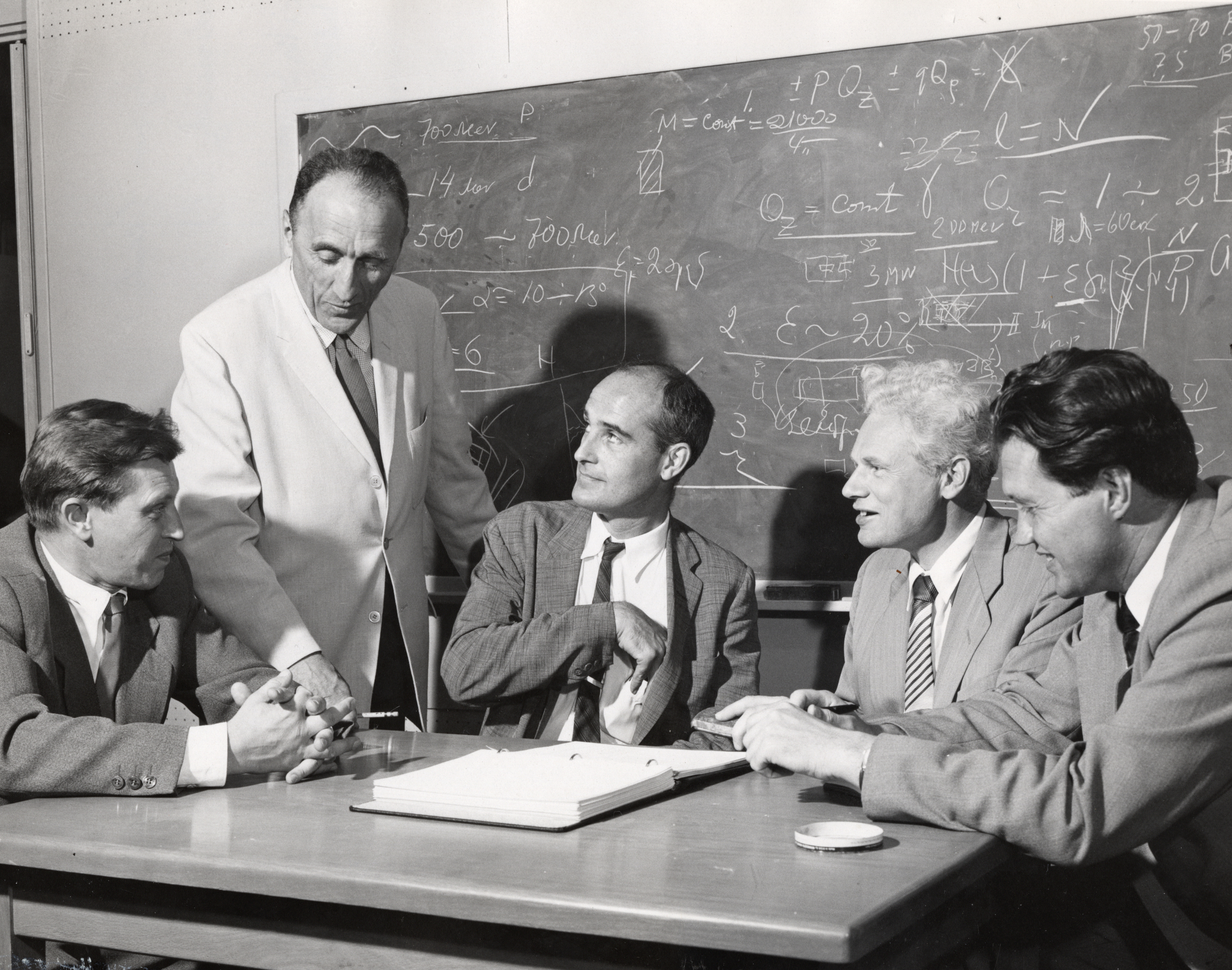   Keith Symon (seated at center) with visiting Soviet scientists. Vladimirsky (on far left), Kolominsky, and Dimitriefsky. Photo: University of Wisconsin Madison Archives  