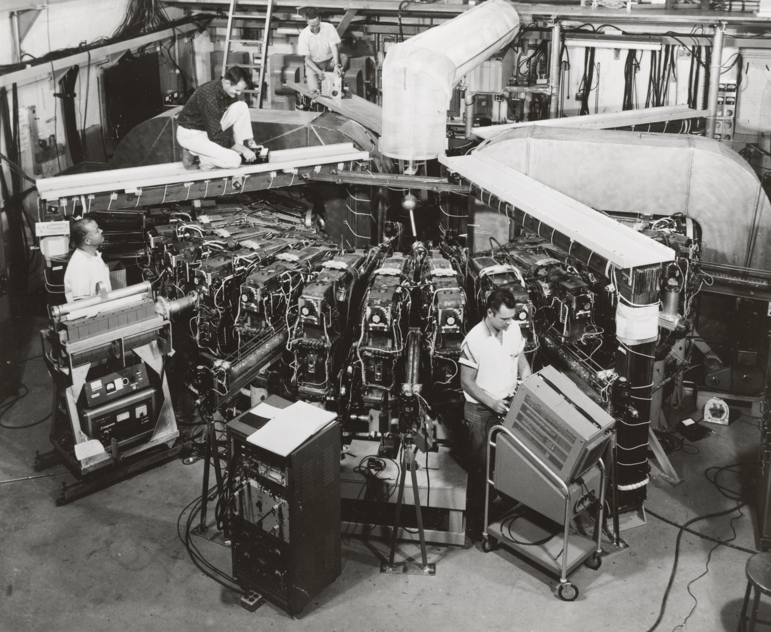   Researchers working on the 50 MeV machine at Midwestern Universities Research Association (MURA).&nbsp; Don Young, Mike Shea, Hugh Thornton, and Jim Hagan. Photo: University of Wisconsin Madison Archives  