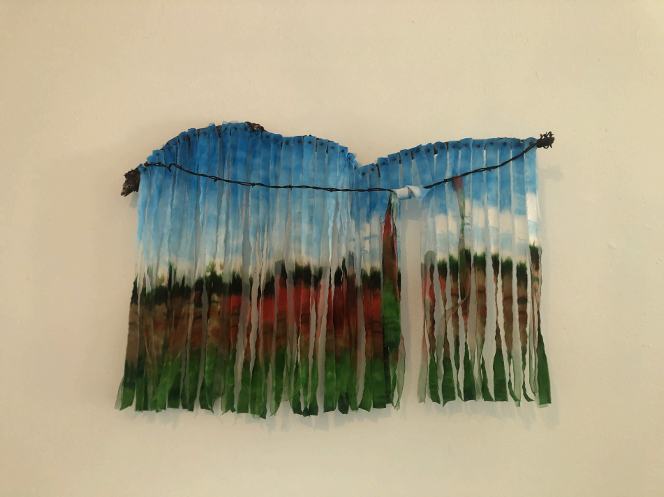 "Blue Skies, Greener Days" Hand-dyed silk, Mesquite branch, barbed wire, tacks