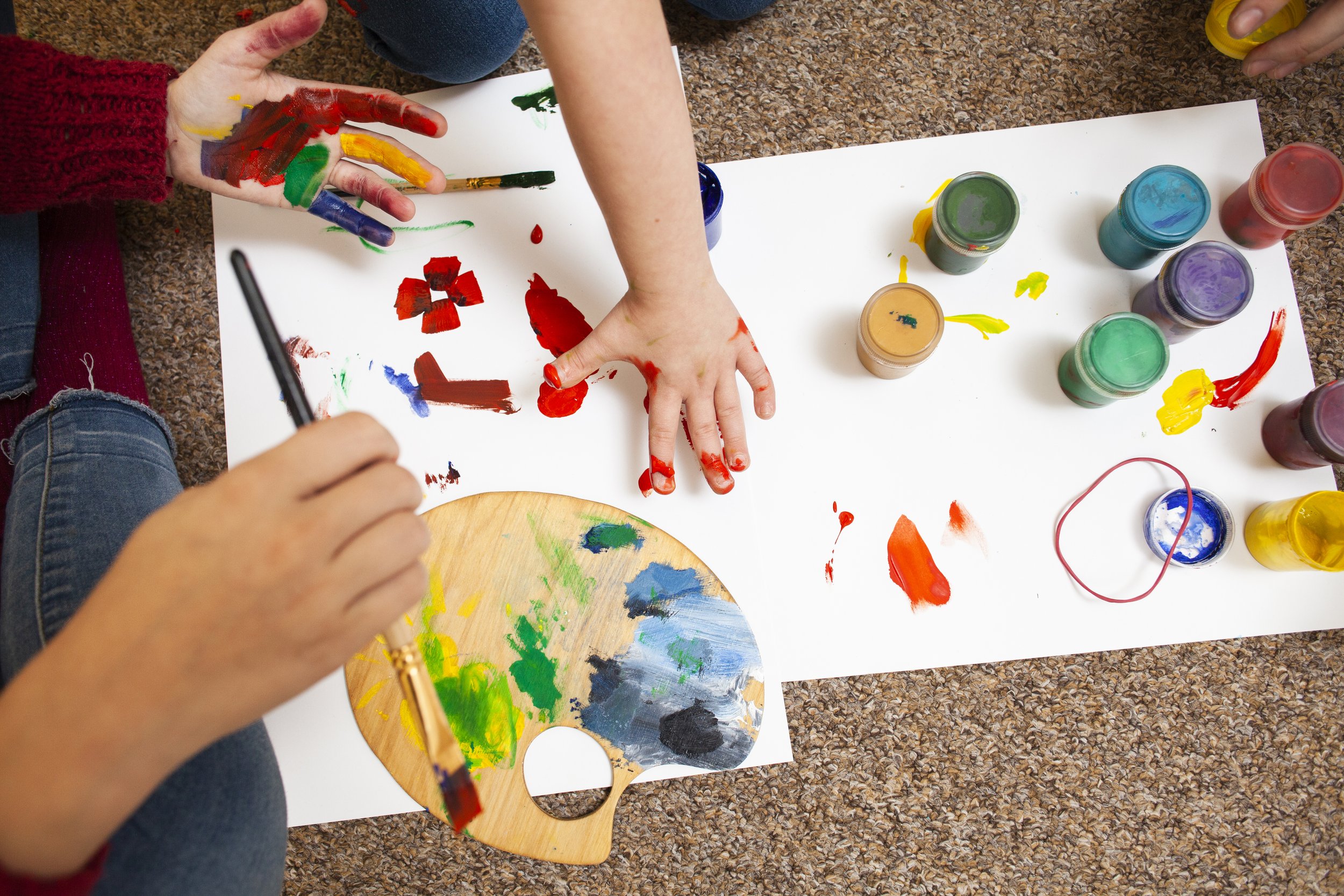 high-angle-child-woman-painting.jpg