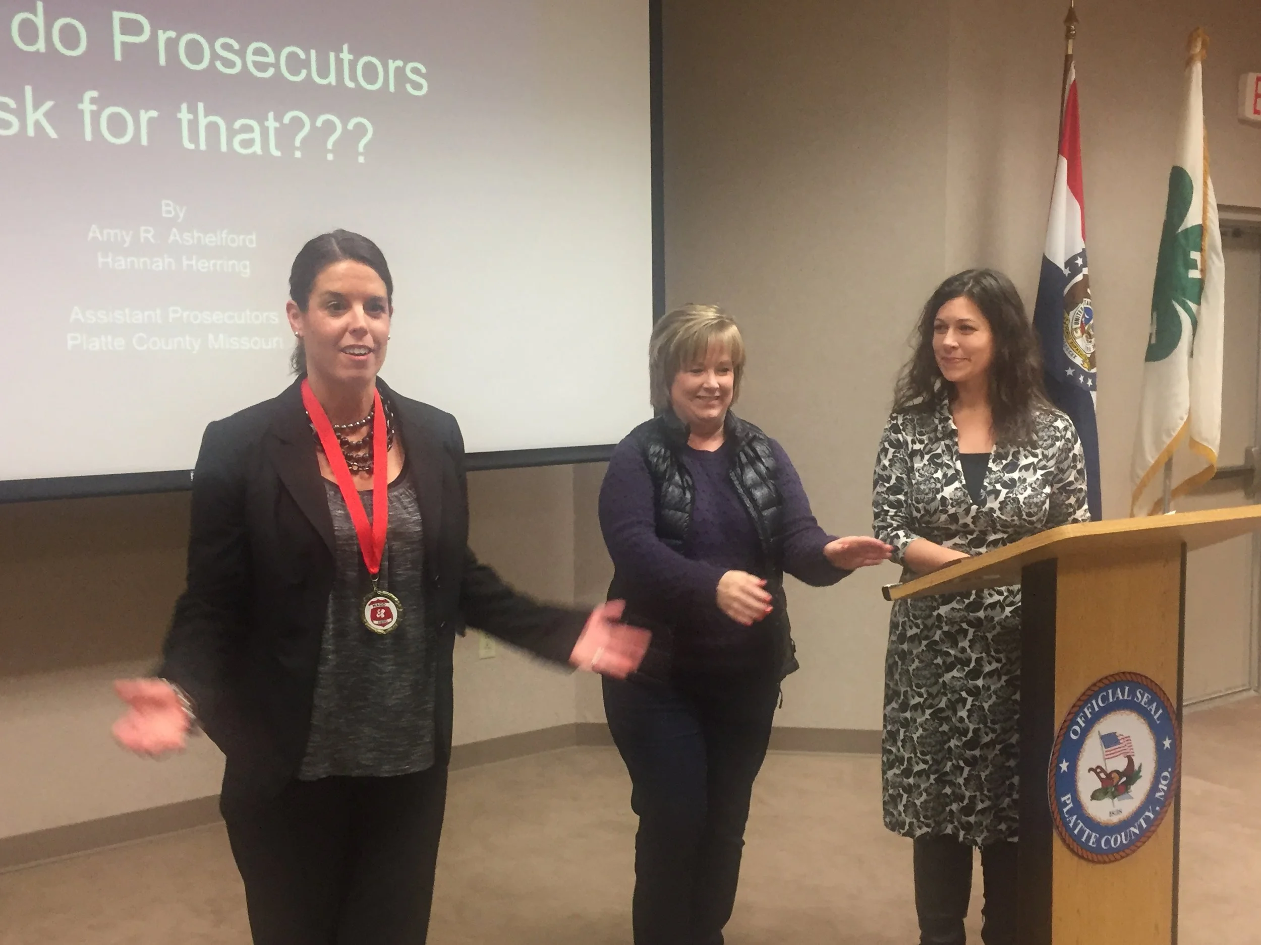Ashelford (left) receiving the MADD Hero Award