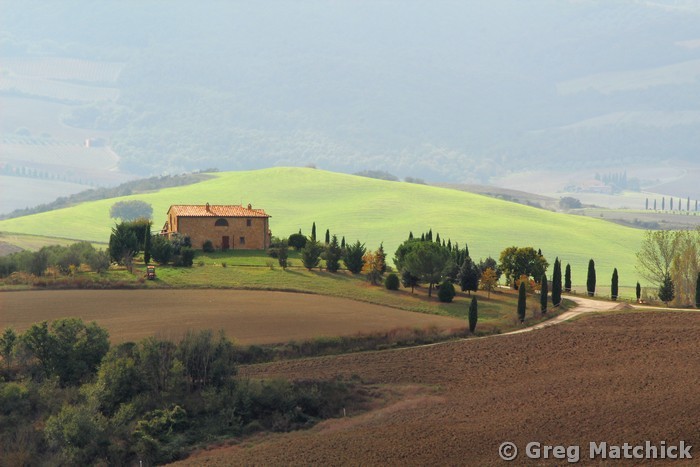 Farmhouse and Illuminated Hill in Tuscany