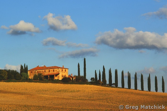 Farmhouse and Ridge of Cypress Trees in Tuscany