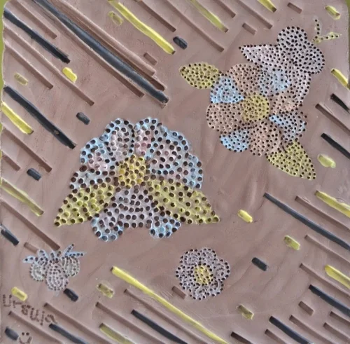 by using the technique of pointillism, making an image out of dots, or in this case pinholes, this tile looks so much like it has been beaded!!