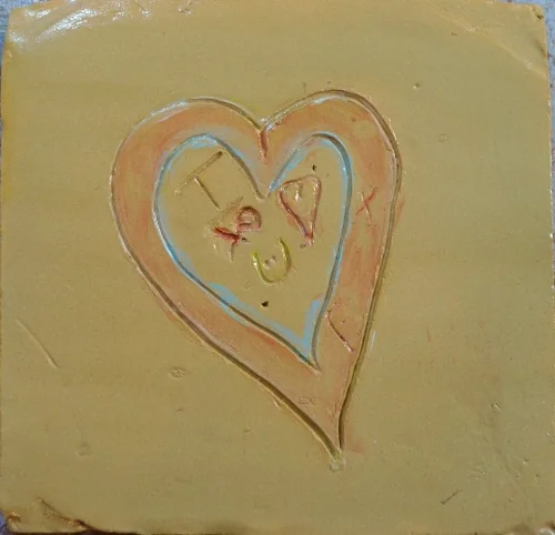 This tile was also a struggle, not because the maker had such a strong vision as much as she found it very difficult to draw/carve on the wet clay. Her head just didn't work in that way. Interestingly I heard this woman speaking quietly with the young teen (horse tile) after the workshop about how life can present difficulties which we need to try and work through. It takes a community...thank you!