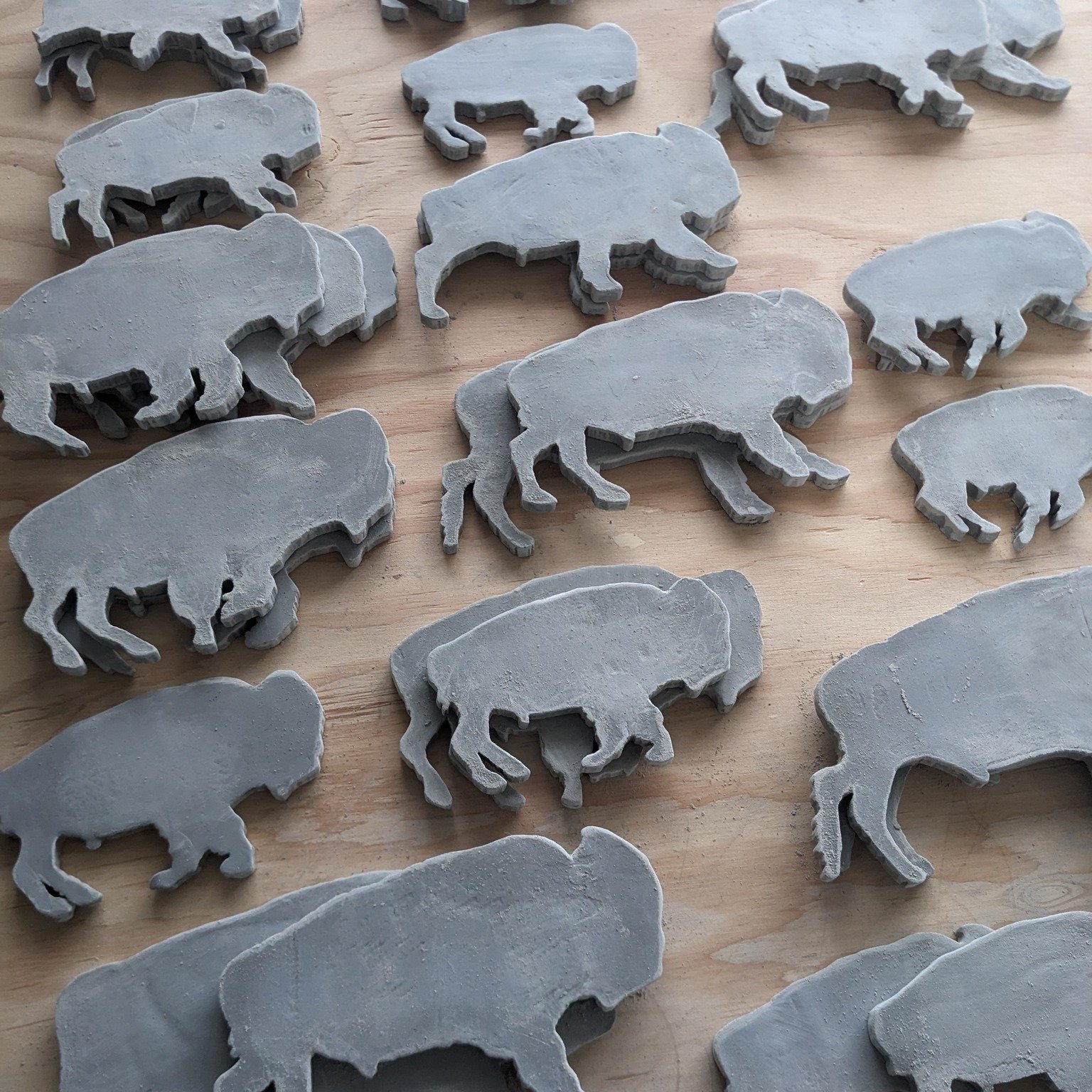 ceramic buffalo herd...preparing for installation