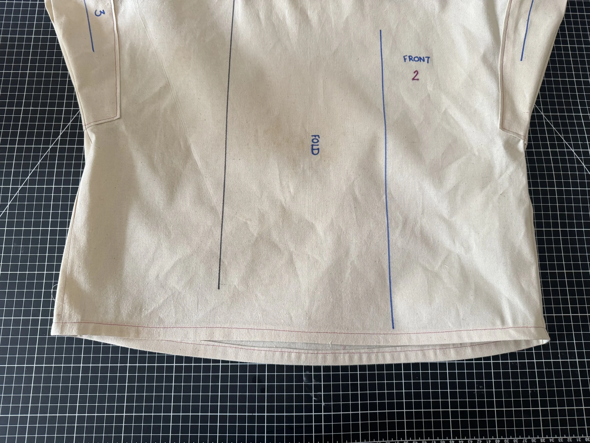 Fold the raw edge in on itself, so you have two folds within your hem and stitch close to the edge from the outside.   Press well.  That’s it, Congratulations!