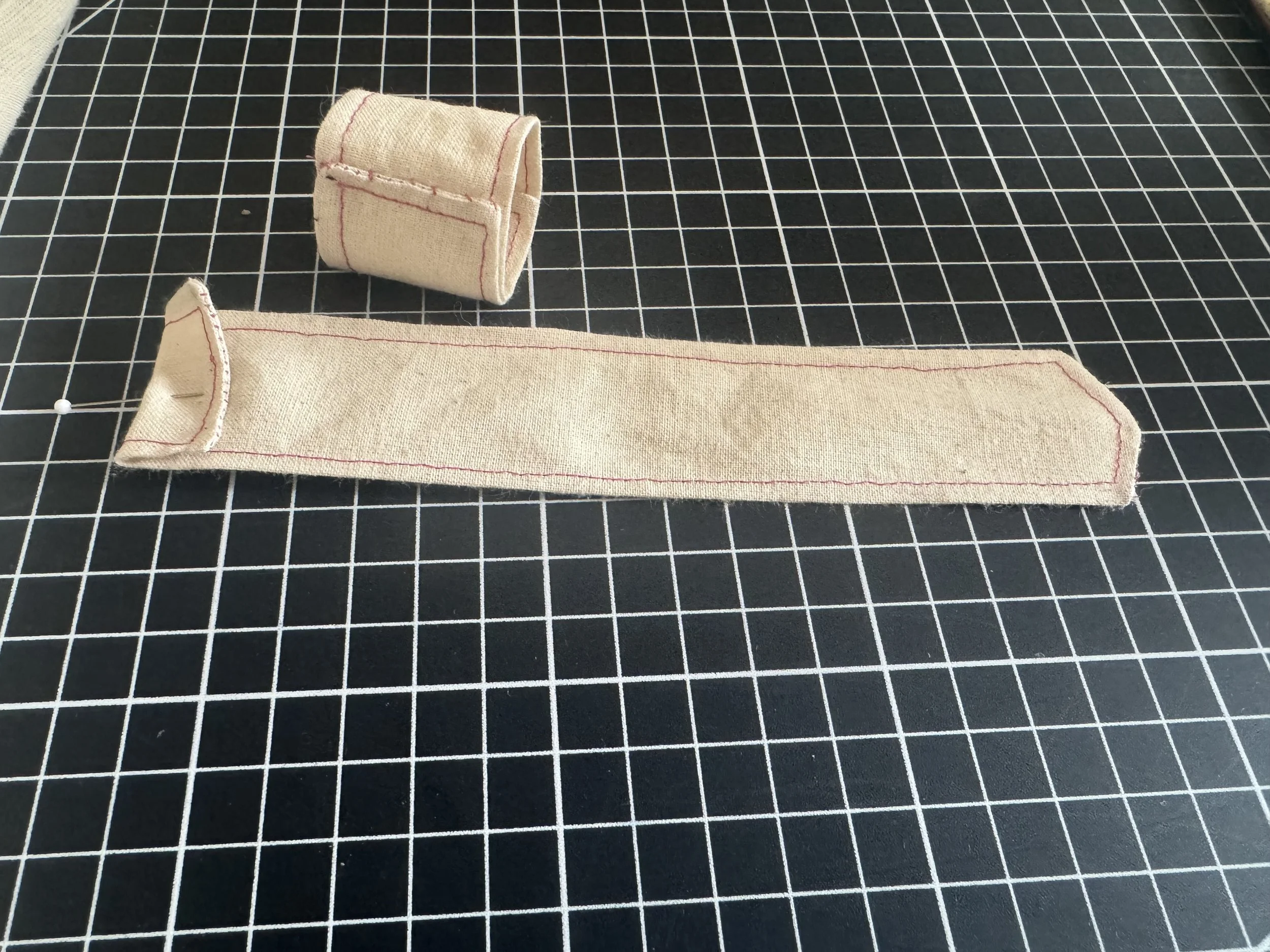  Hand stitch the loop closed. 
