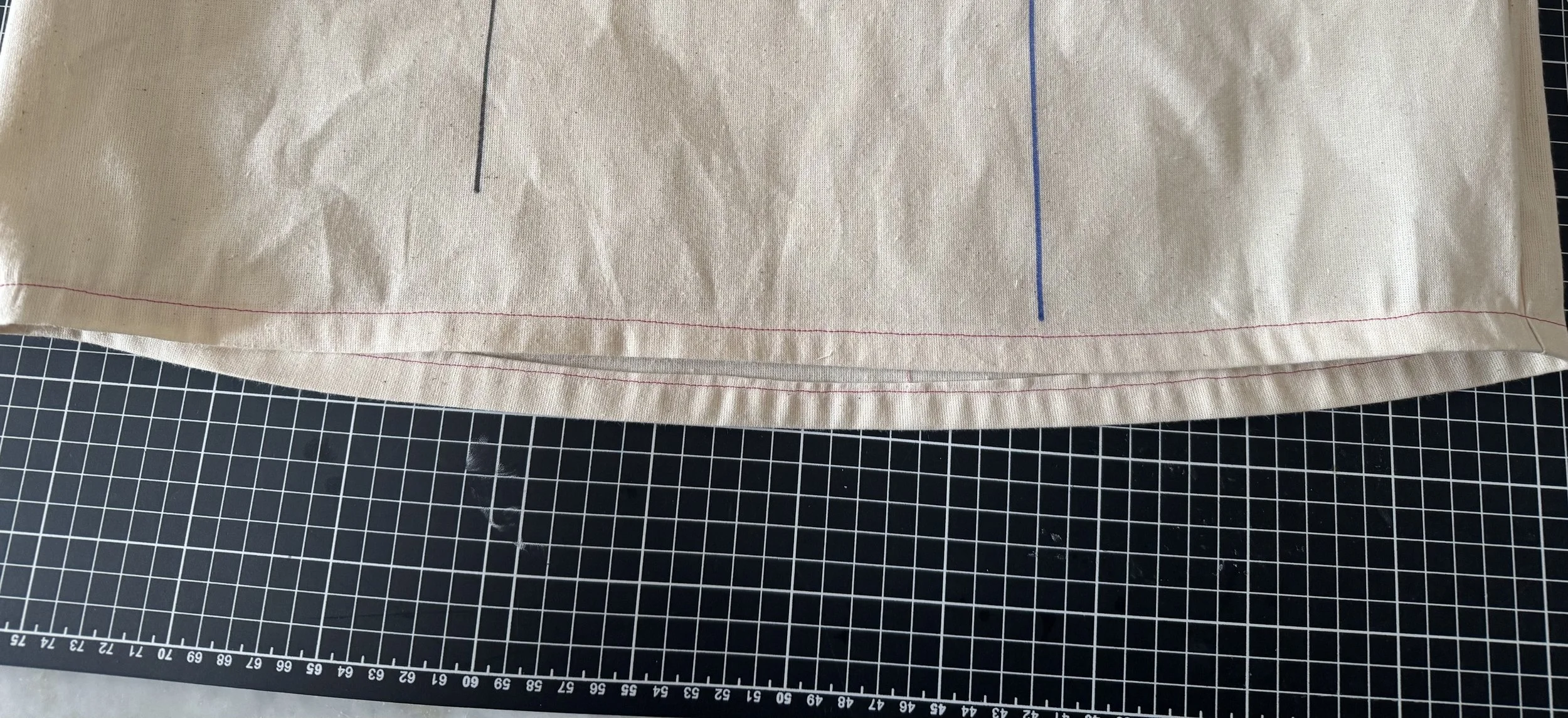  Fold again to encase the raw edge and stitch close to the edge. 