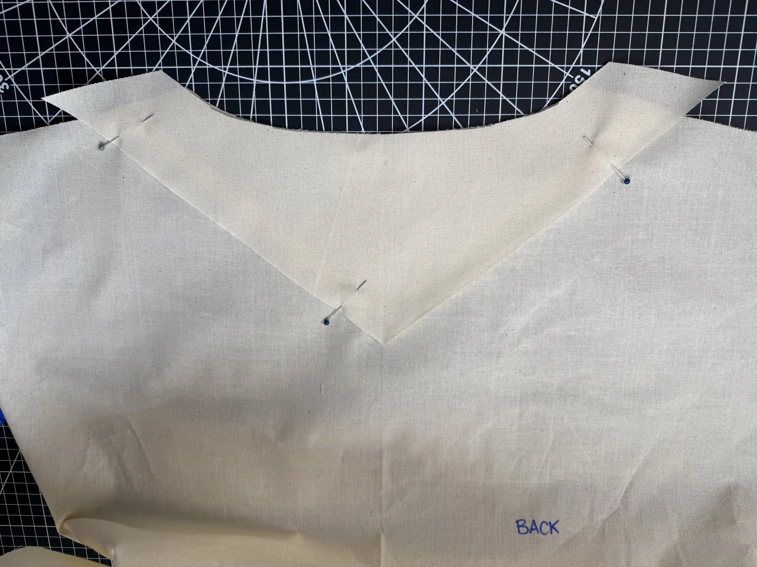  Pin the back yoke to the back bodice, right side to right side. 