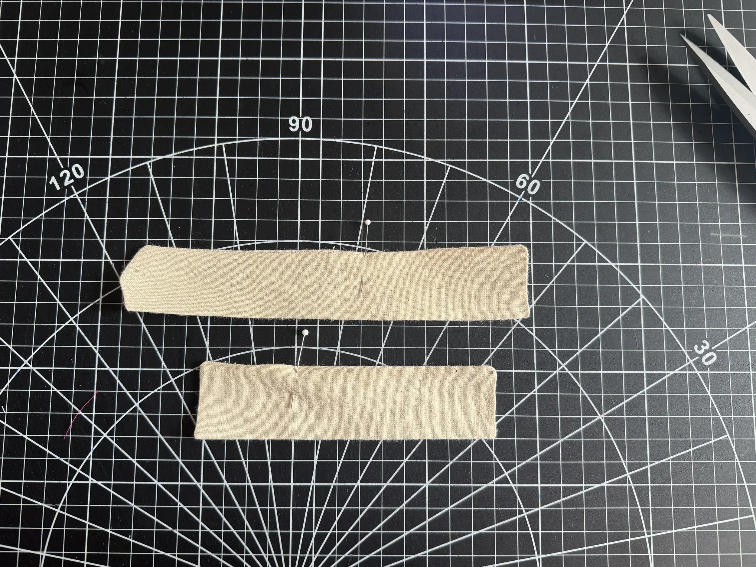  Turn your pieces, fold your opening seam allowances in and pin to hold.   Press well, and top stitch. 