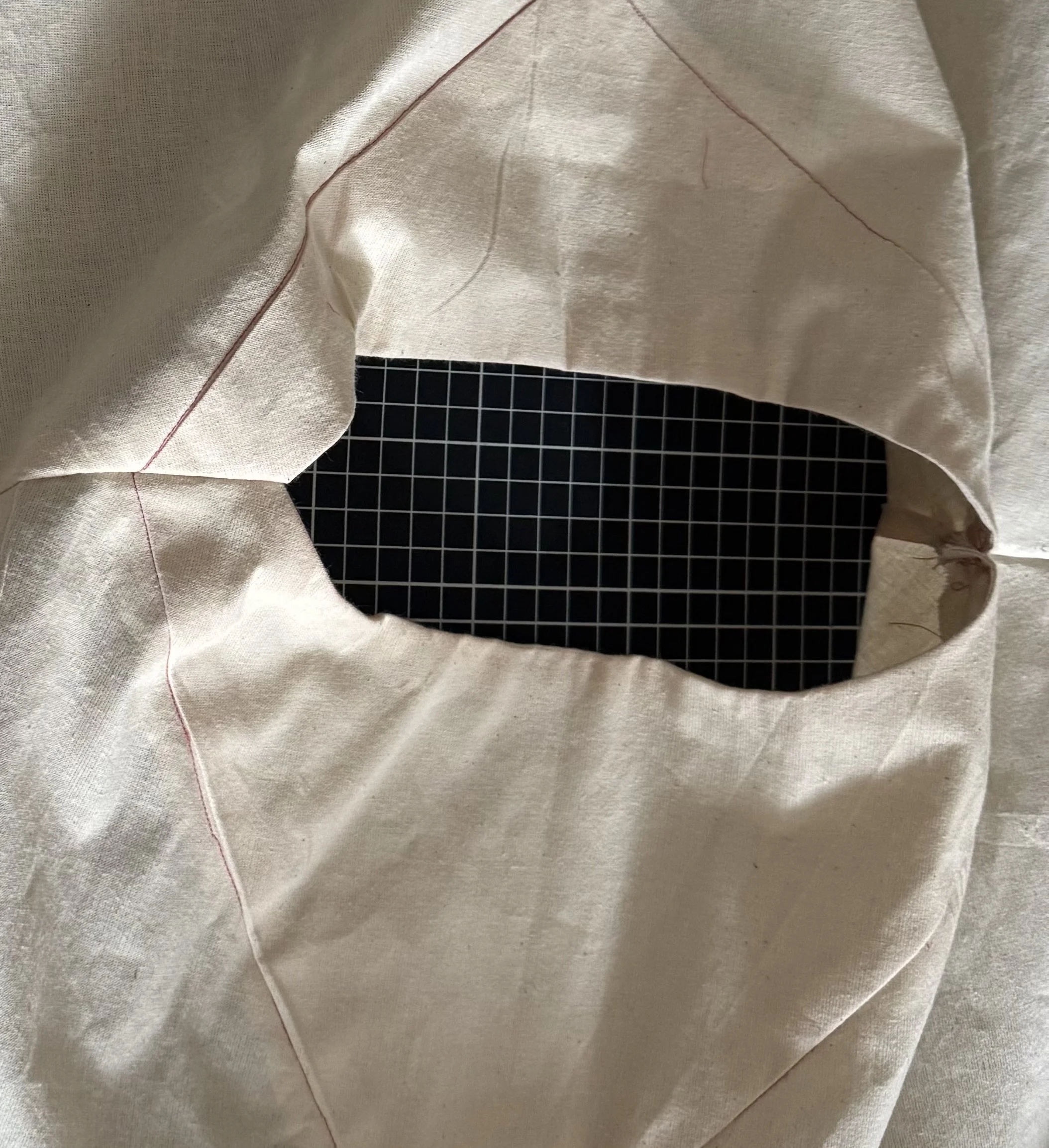  Next up:  Back Yoke.  *As you see above, the back yoke will join the front yoke at the shoulder seam.   Before sewing the back yoke, measure the front yoke at the shoulder seam, and ensure you start your stitch in the same place on the back so they line up when you join the two together. 