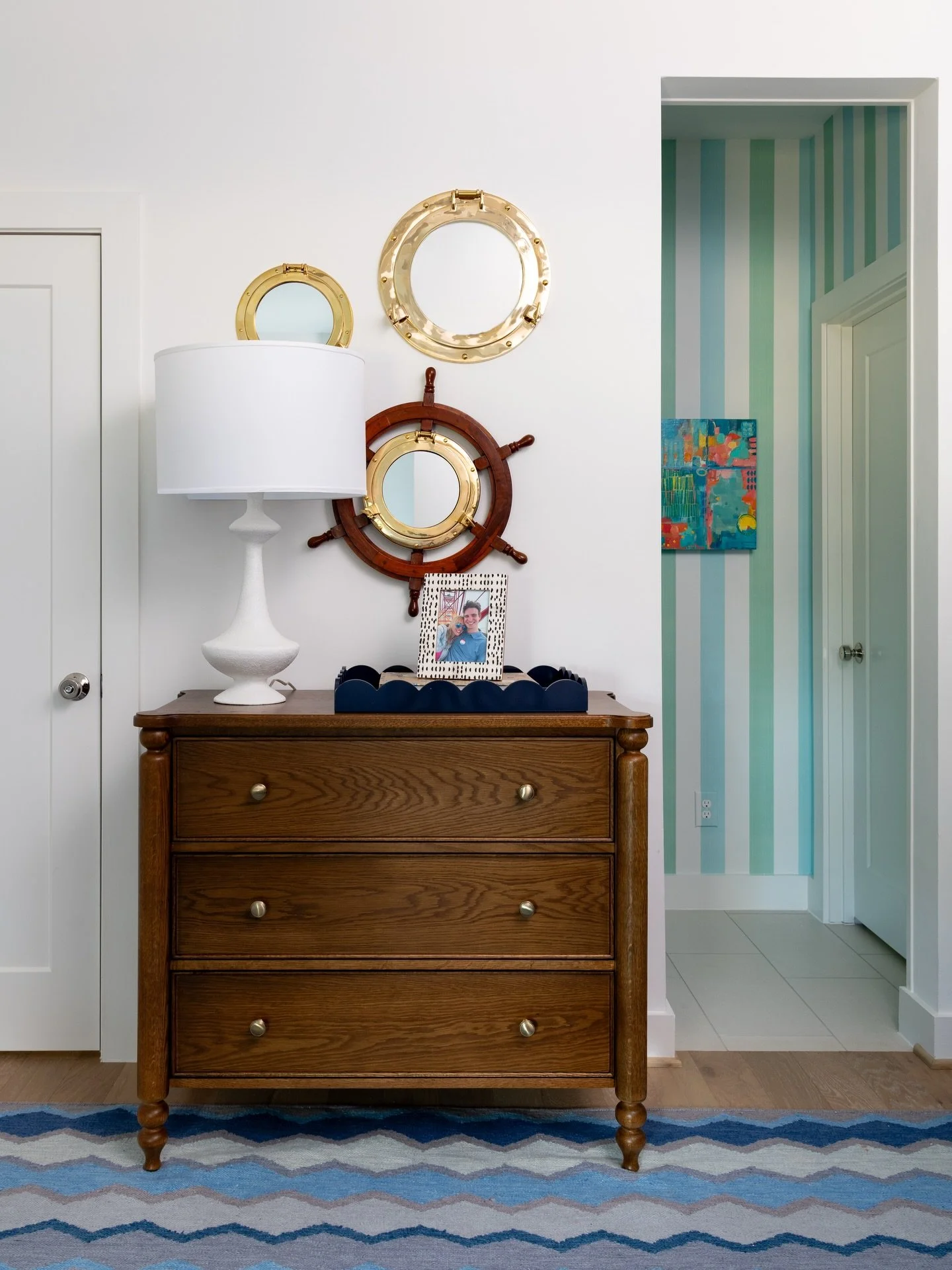 Even the kids&rsquo; rooms get their own little seaside moment. ⚓️

The Dover 3-Drawer Chest and Marabella Table Lamp from @ballarddesigns laid the perfect foundation for a space made for bunking cousins, salty hair, and summer stories. The wall of p