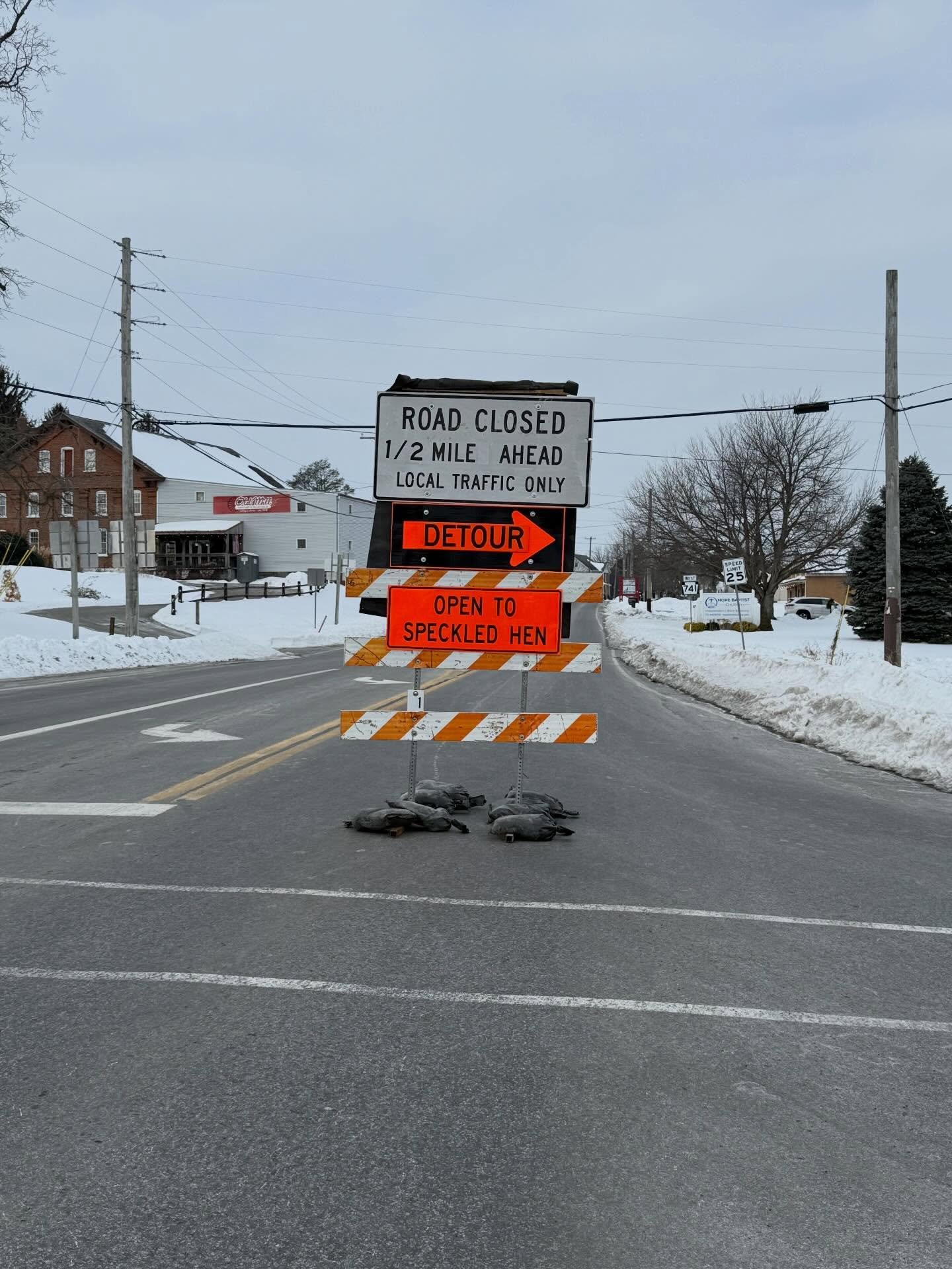 We are open and ready to serve you! These road closure signs are up on E Main st for the foreseeable future but our customers are allowed to use the road and come to the cafe. If you have any questions please give our team a call.