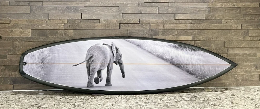 Surfboarder designs and makes surfboard for non-profit | Over And