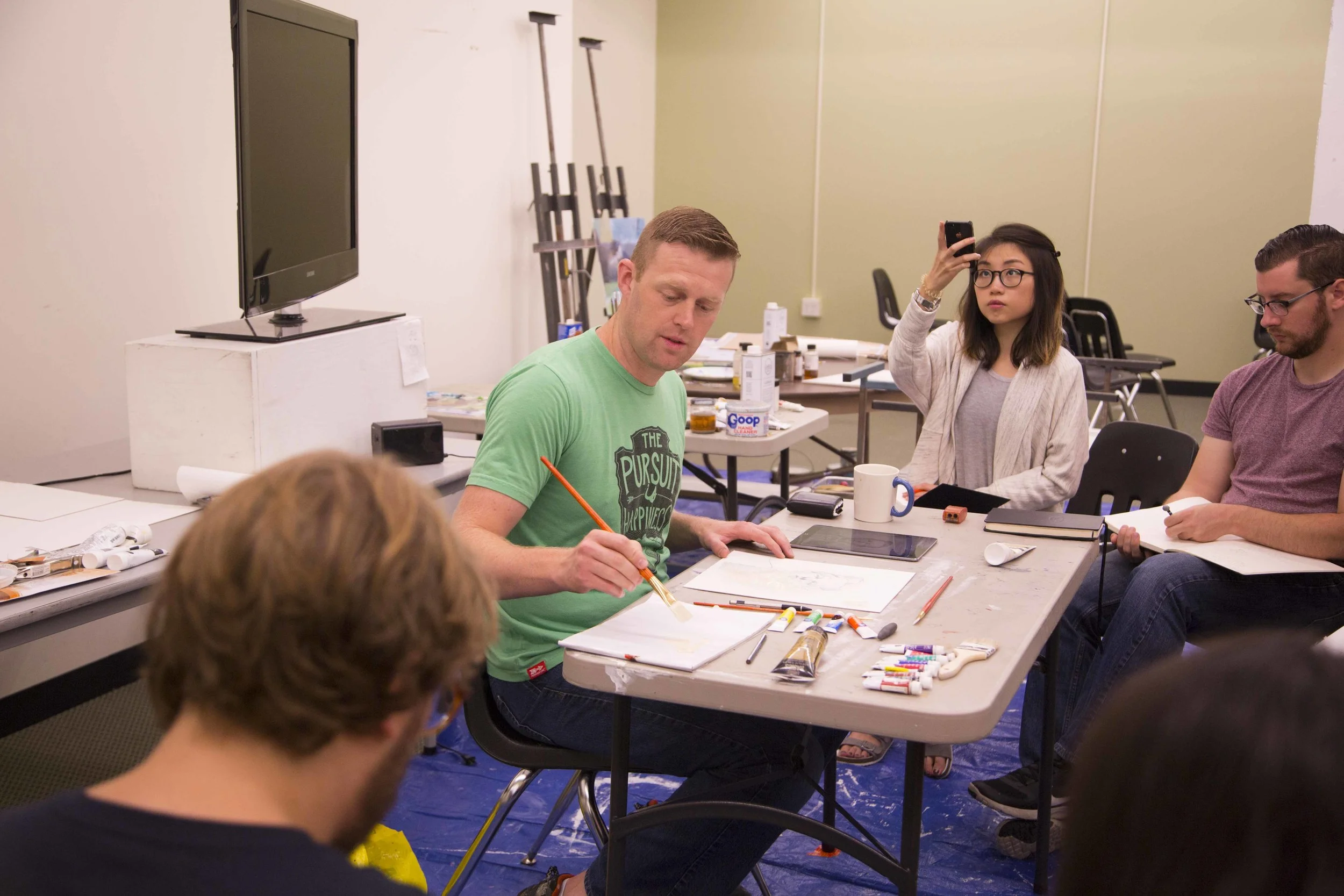 Sterling Hundley completes a demo for students at The Illustration Academy.