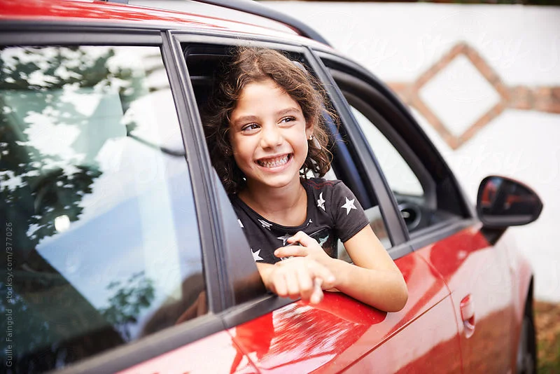 kid in car.jpg