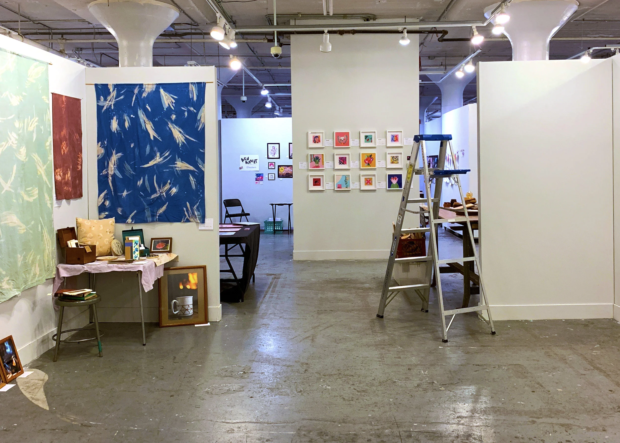 Artists set up their spaces for the MIAD Holiday Sale