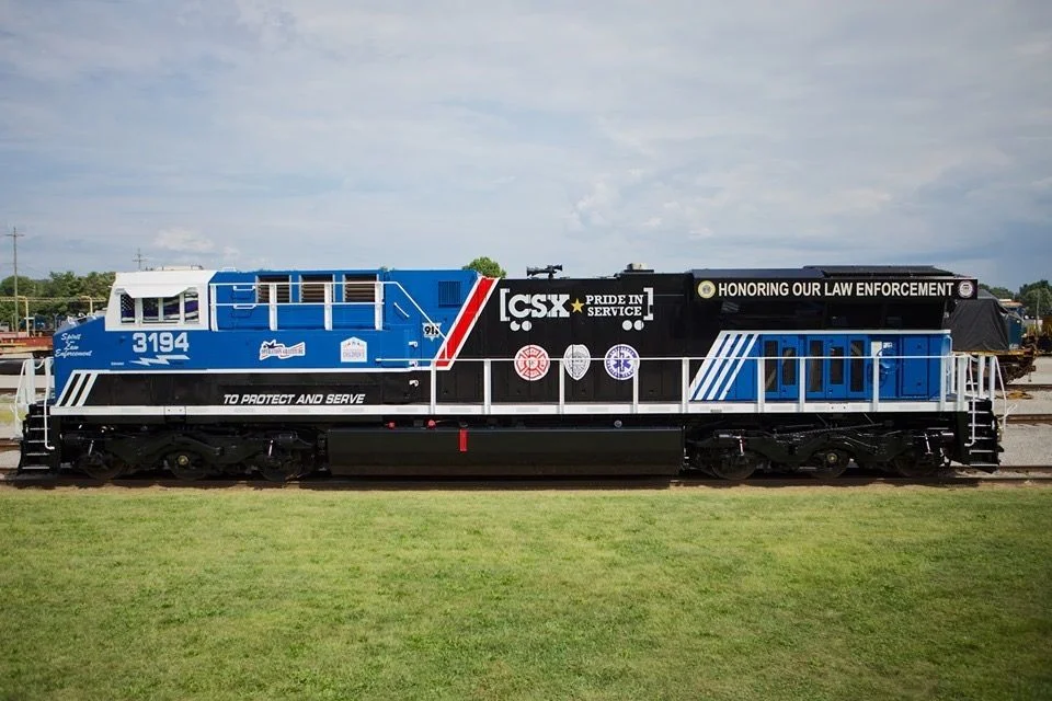 HUNTINGTON, W.Va. – CSX Transportation’s "Spirit of our Law Enforcement" commemorative locomotive is being unveiled today at the company’s Huntington locomotive shop. CSXT 3194 is being renamed to honor our nation’s police officers who dedicate their lives to serve and protect communities across our network. Courtesy of CSX Railroad. *************************************************************************************************************************************************************************************************************