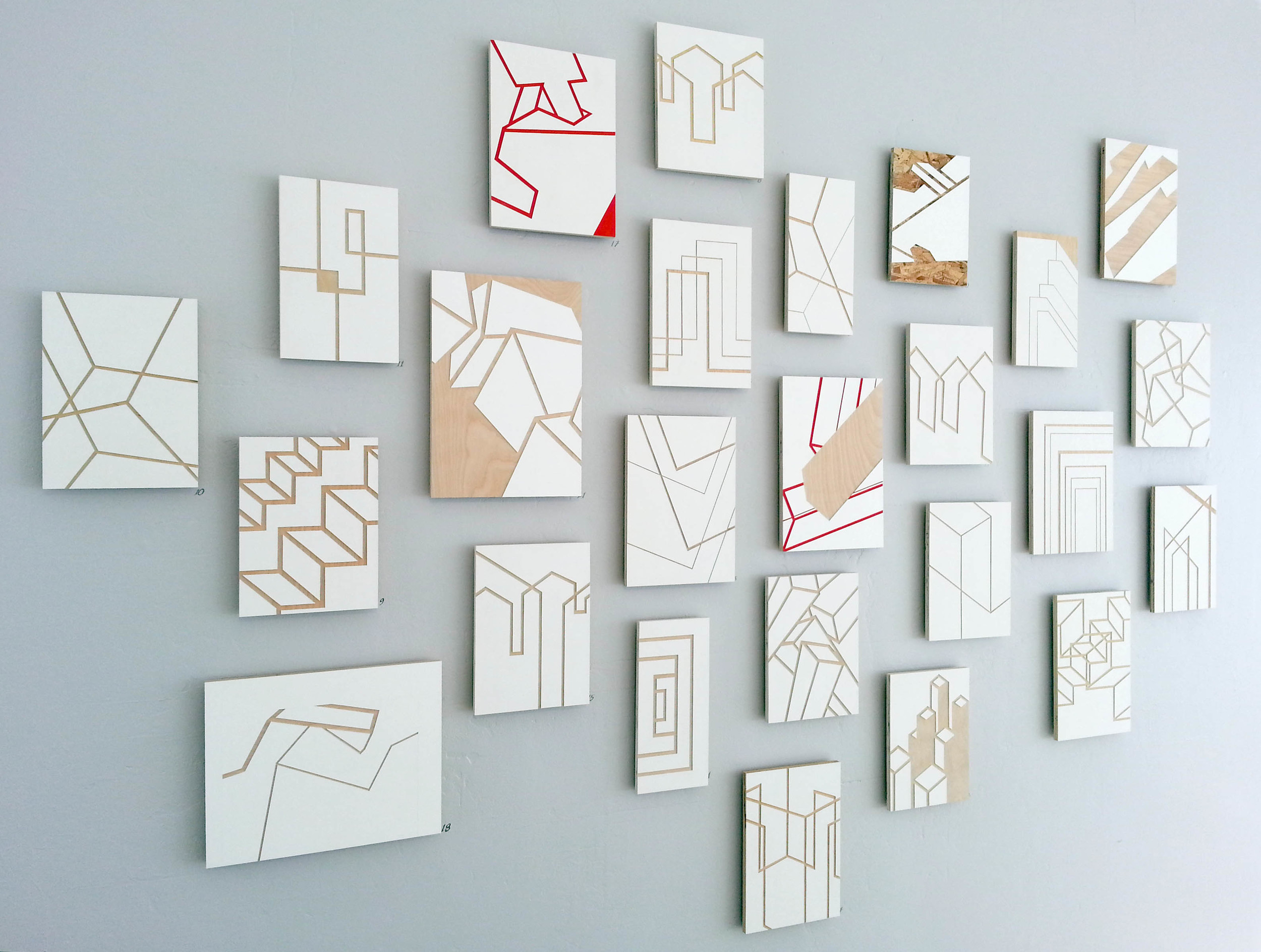 Exhibit wall with 25 cutouts