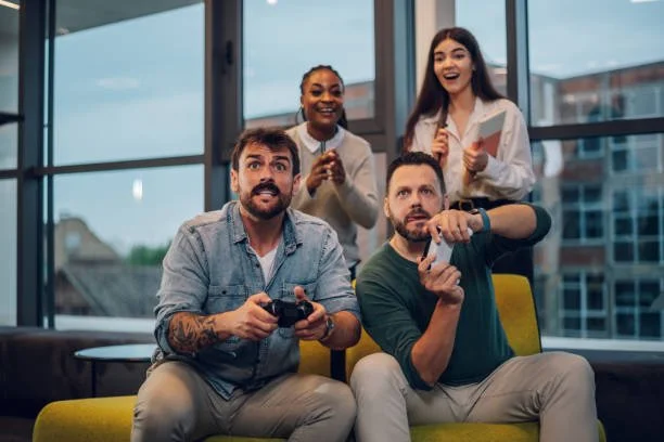   Example of employees playing games at workplace  