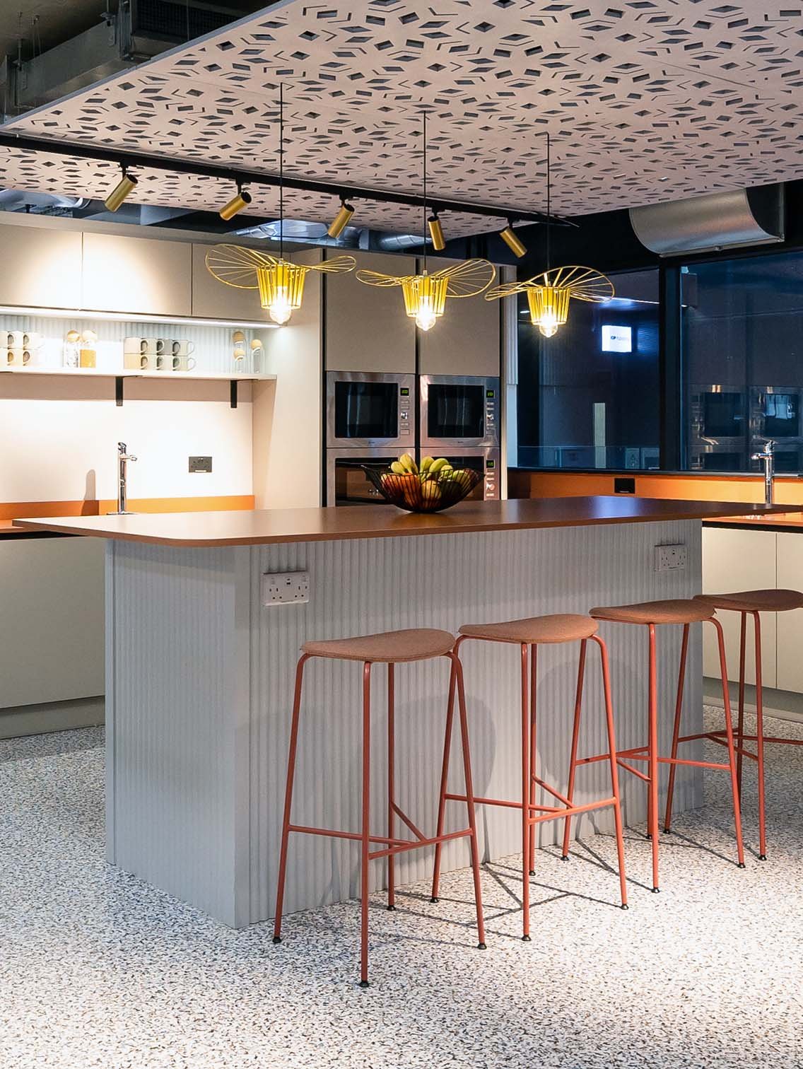 Teapoint-in-IOP-Publishing-Bristol-with-feature-ceiling-acoustic-pannels-and-bold-pendant-lighting.jpg