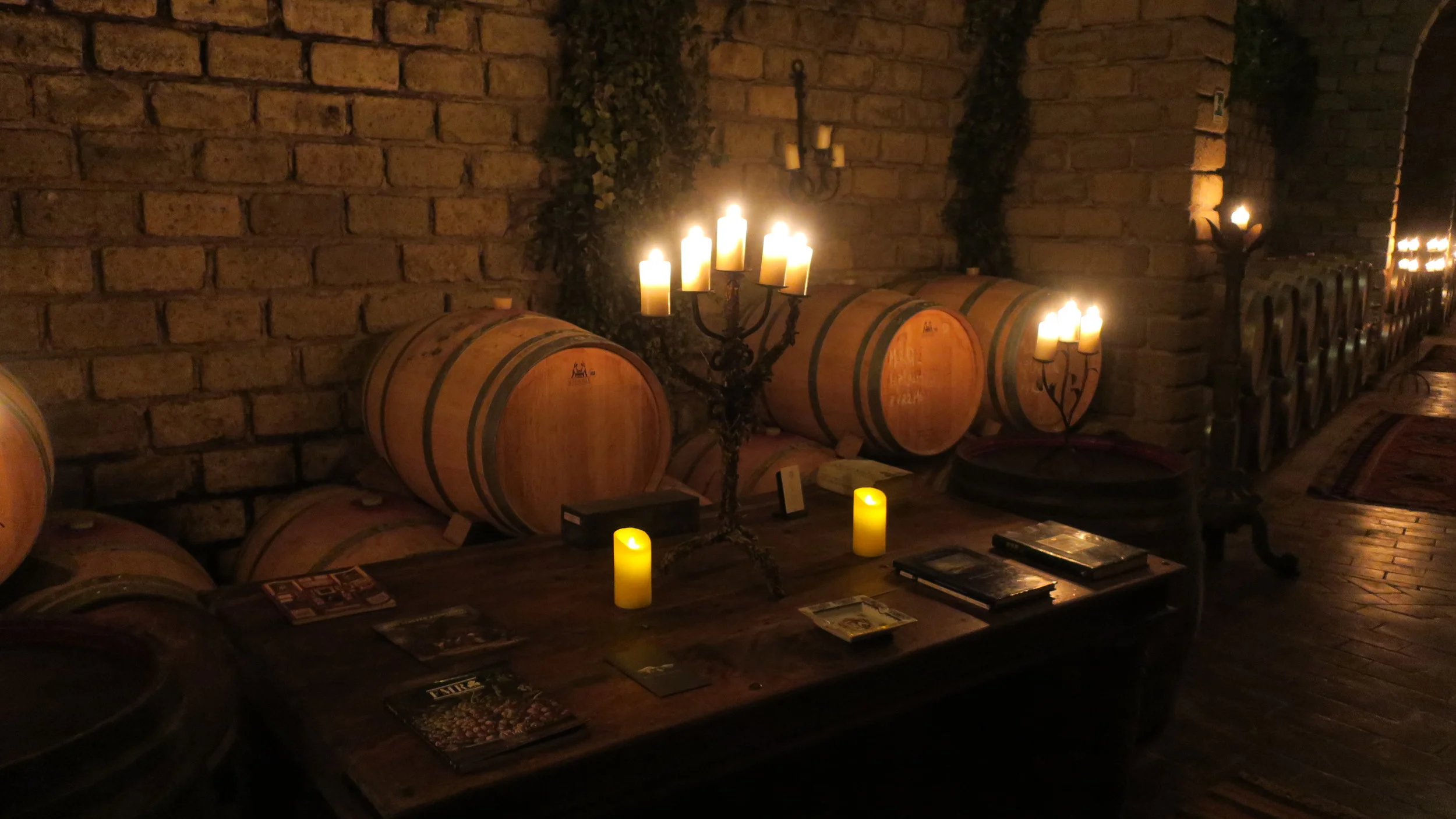 French Barrels resting in D'Amico Wine cellar that has been carved into Tufa rocks (Photo credit: Sumi_Sumilier)