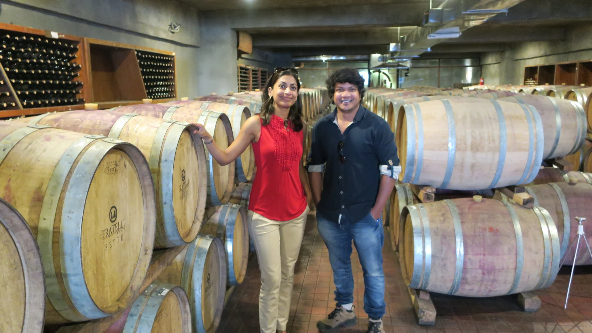 Sumi with Vrushal Kedari, winemaker of Fratelli in the barrel room below the Fratelli winery (Photo credit: Sumi Sarma)