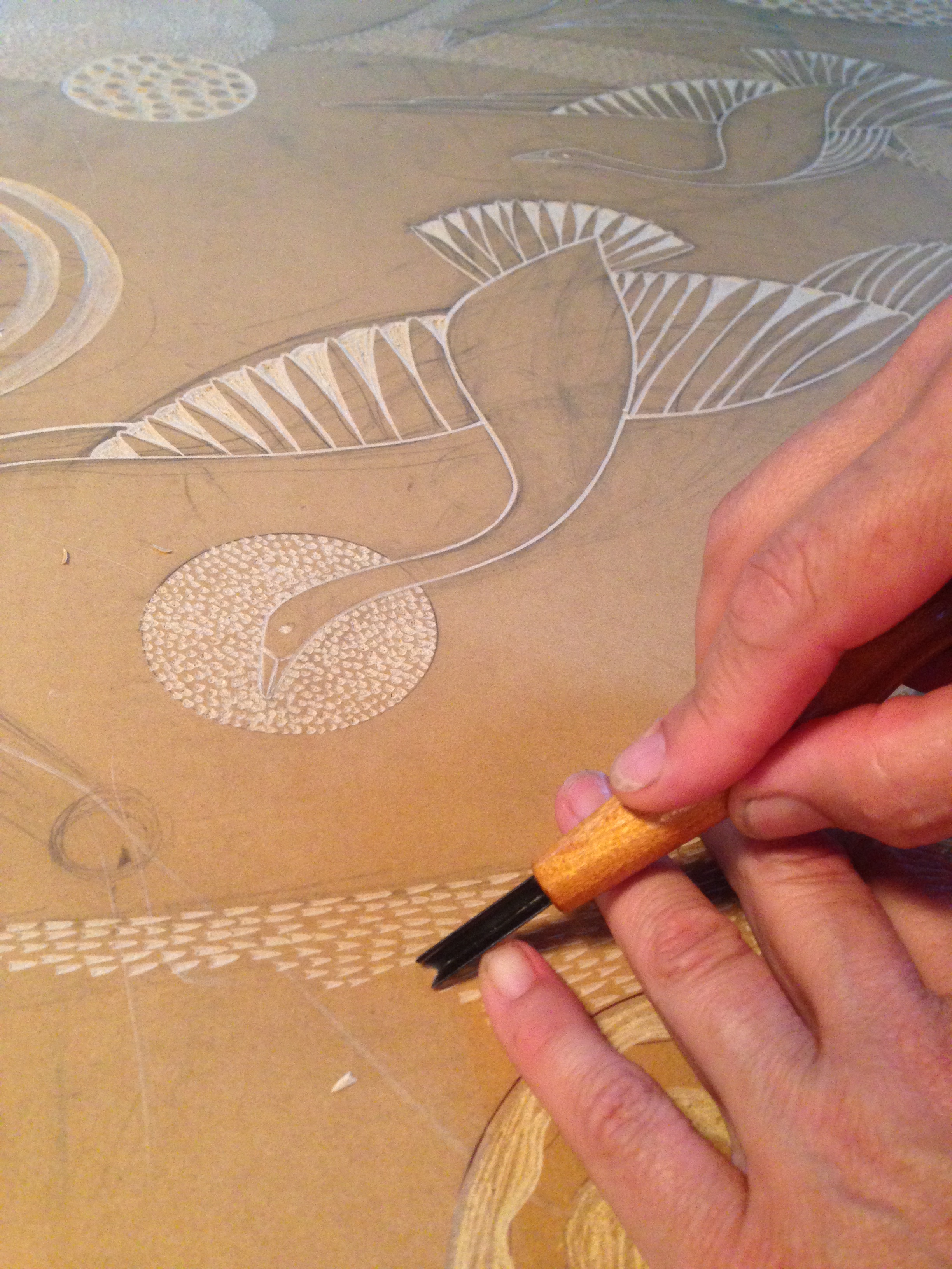 carving the linoleum for Swooping and Swirling