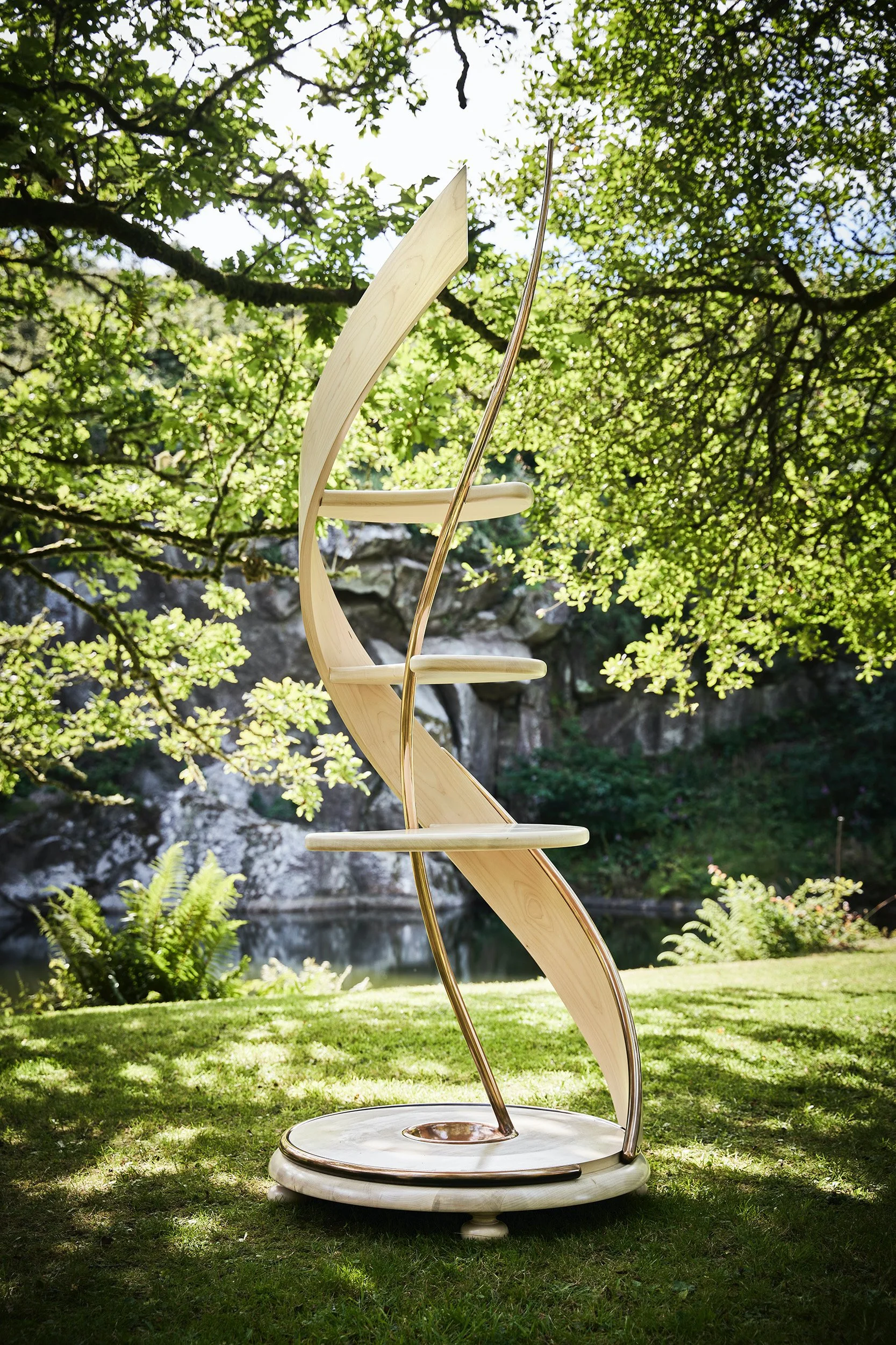 A Sycamore and bronze console sculpture