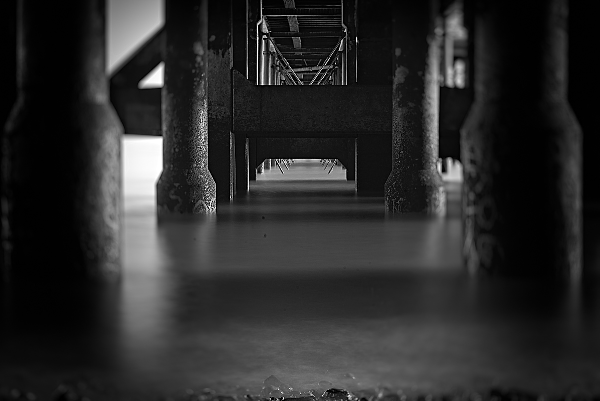 20 Second exposure under Penarth pier ... processed in Alien Skin Exposure 7 utllising the bokeh and focus sliders.