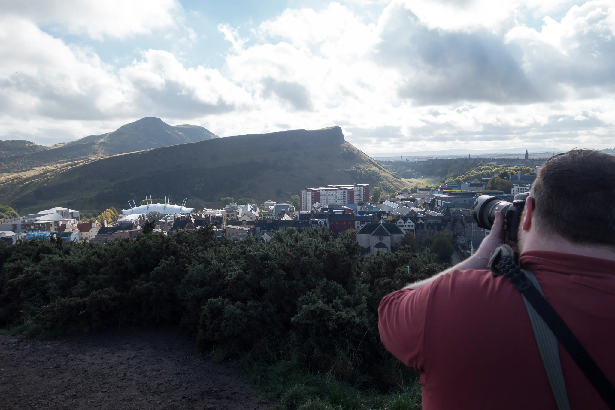 Brian taking a photo on Calton Hill in Edinburgh by Jess.